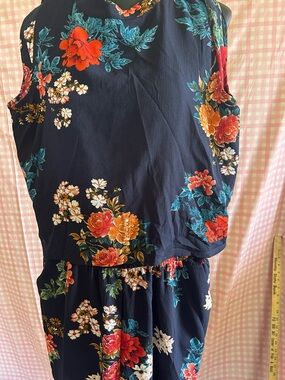 Navy Floral Sleeveless romper with Orange & Teal Blooms